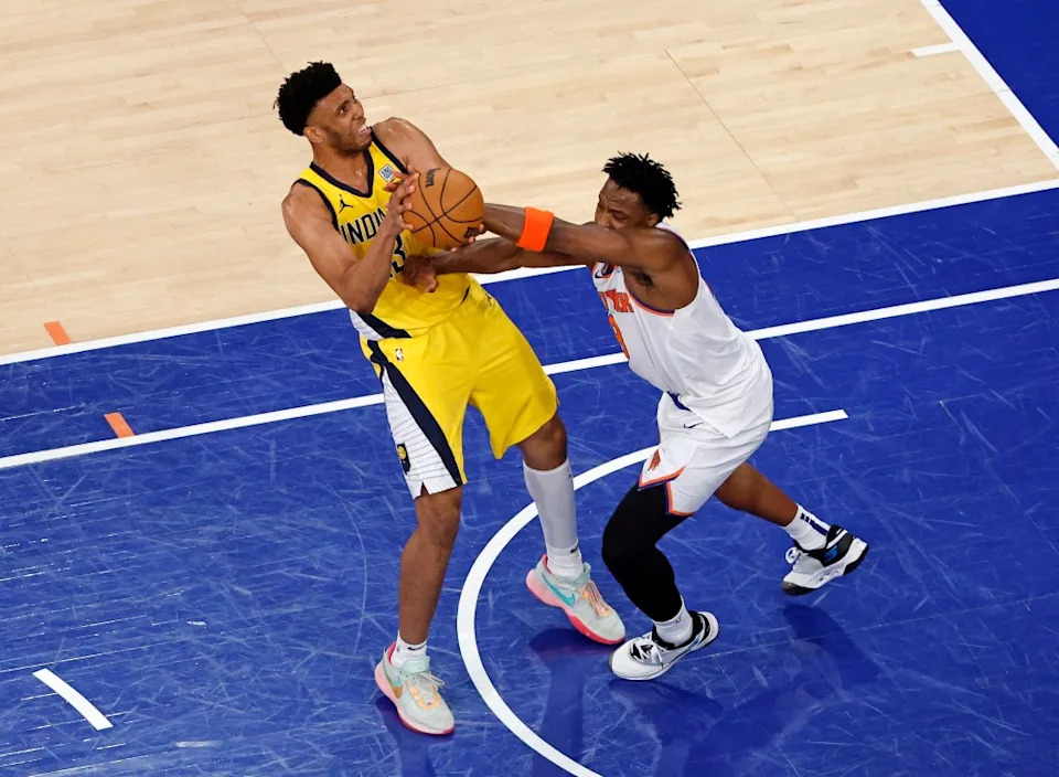 Tony Bradley (l.) fights for possession during the Pacers’ Game 2 win against the Knicks on May 23. Jason Szenes for the NY Post
