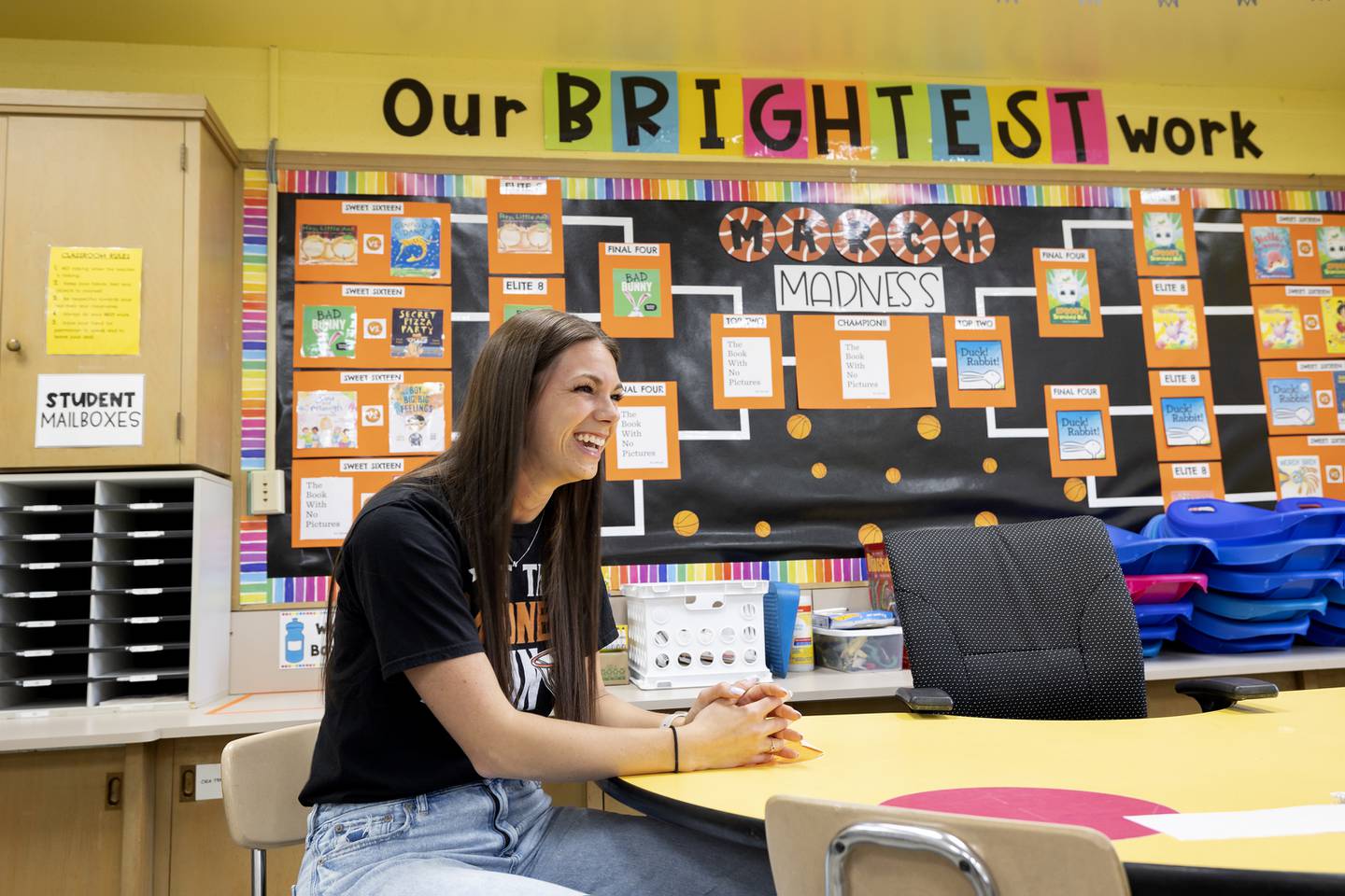 Britney Pitzer, third grade teacher at Jefferson in Dixon, talks about her basketball background being the inspiration to set up a March Madness of books for her students to vote on.