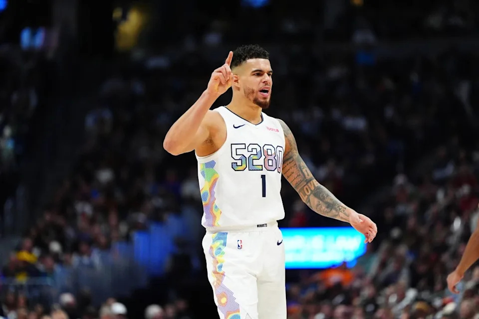 Dec 23, 2024; Denver, Colorado, USA; Denver Nuggets forward Michael Porter Jr. (1) calls out in the second quarter against the Phoenix Suns at Ball Arena. Mandatory Credit: Ron Chenoy-Imagn Images Mandatory Credit: Ron Chenoy-Imagn Images