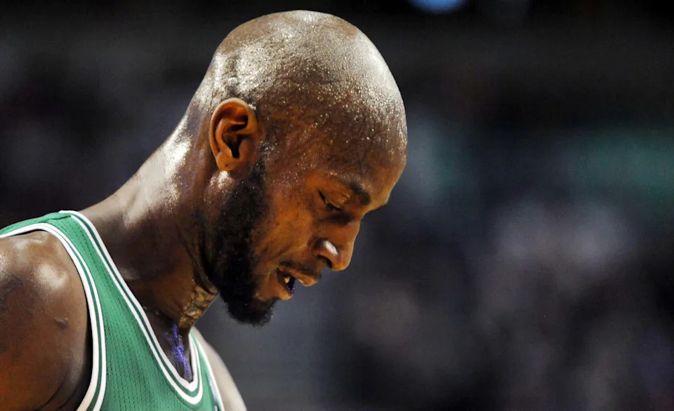 Feb. 24, 2013; Portland, OR, USA; Boston Celtics power forward Kevin Garnett (5) walks to the bench during a time out during the fourth quarter of the game against the Portland Trail Blazers at the Rose Garden. The Blazers won the game 92-86. Mandatory Credit: Steve Dykes-USA TODAY Sports