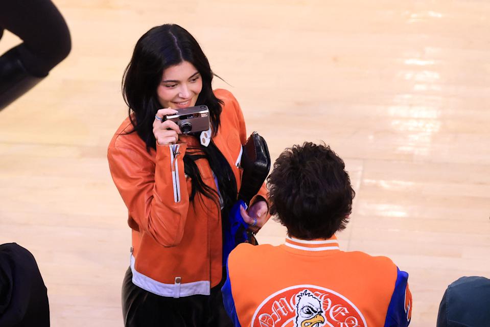 Jenner was spotted taking a photo of her boyfriend of two years. AFP via Getty Images