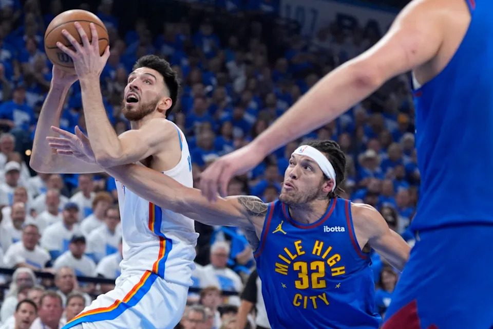 Oklahoma City Thunder forward Chet Holmgren (7) puts p a shot beside Denver Nuggets forward Aaron Gordon (32) during Game 5 of the NBA playoff series between the Oklahoma City Thunder and the Denver Nuggets at Paycom Center in Oklahoma City, Tuesday, May 13, 2025.