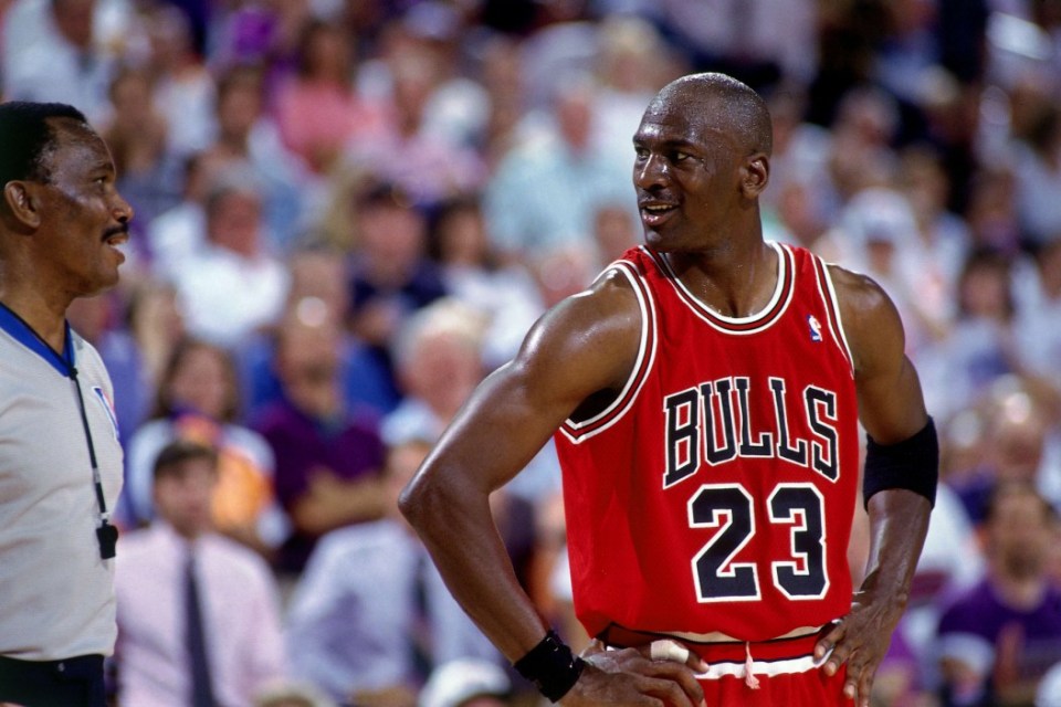 PHOENIX - JUNE 9:  Michael Jordan #23 of the Chicago Bulls chats with a referee in Game One of the 1993 NBA Finals on June 9, 1993 at the America West Arena in Phoenix, Arizona.  The Bulls won 100-92.  NOTE TO USER: User expressly acknowledges and agrees that, by downloading and/or using this Photograph, user is consenting to the terms and conditions of the Getty Images License Agreement. Mandatory Copyright Notice: Copyright 1993 NBAE  (Photo by Nathaniel S. Butler/NBAE via Getty Images)