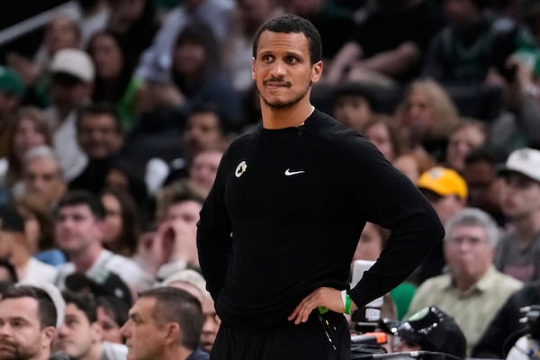 Boston Celtics head coach Joe Mazzulla watches his players during the first half in game 5 of a first-round NBA playoff basketball series against the Boston Celtics, Tuesday, April 29, 2025, in Boston. (AP Photo/Charles Krupa)