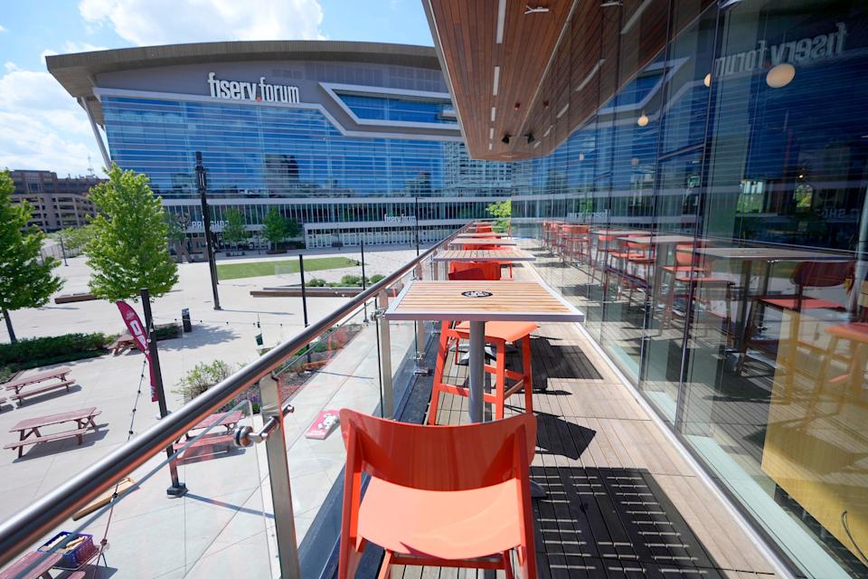 The patio at the New Fashioned in Deer District overlooks Fiserv Forum in Milwaukee on Thursday, May 23, 2024.