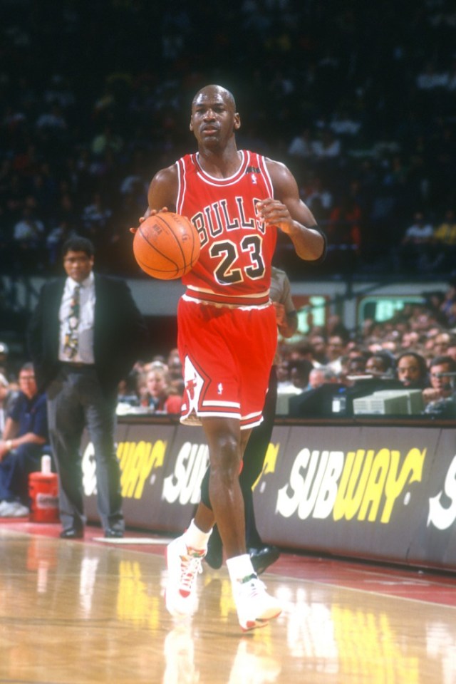 LANDOVER, MD - DECEMBER 23: Michael Jordan #23 of the Chicago Bulls dribbles up court during a NBA basketball game against the Washington Bullets at Capital Centre on December 23, 1992 in Landover, Maryland.  (Photo by Mitchell Layton/Getty Images)