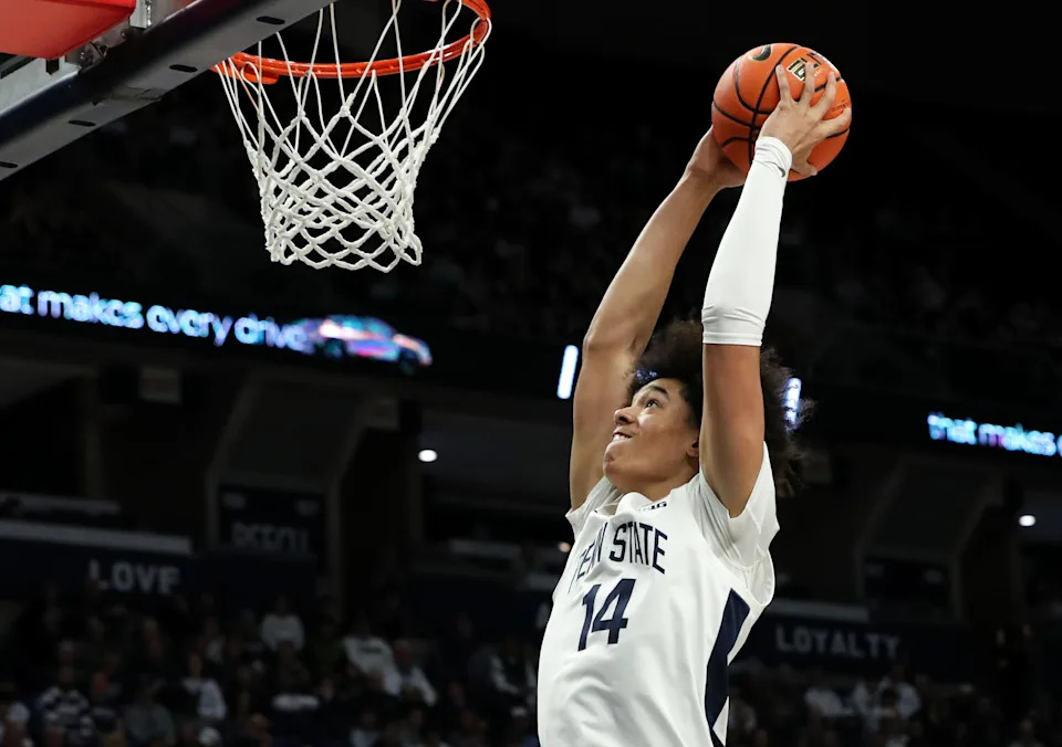 Jan 12, 2025; University Park, Pennsylvania, USA; Penn State Nittany Lions forward Yanic Konan Niederhauser (14) drives the ball to the basket during the first half against the Oregon Ducks at Bryce Jordan Center. Mandatory Credit: Matthew O'Haren-Imagn Images