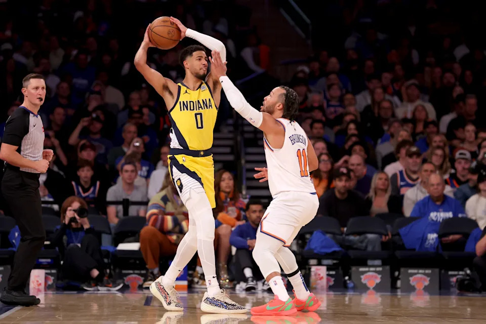 Pacers guard Tyrese Haliburton (0) looks to pass the ball against Knicks guard Jalen Brunson (11).Brad Penner-Imagn Images
