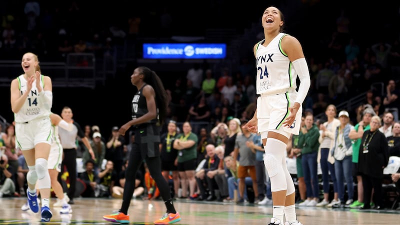 Lynx forward Napheesa Collier (right) said at Friday's game that George Floyd's death five years ago "exposed the holes that are still in our justice and criminal institutions today."