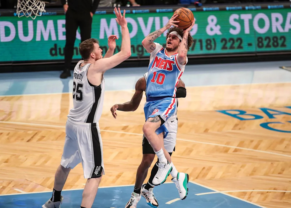 May 12, 2021; Brooklyn, New York, USA; Brooklyn Nets guard Tyler Johnson (10) drives into the lane for a layup in the third quarter against the San Antonio Spurs at Barclays Center. Mandatory Credit: Wendell Cruz-USA TODAY Sports