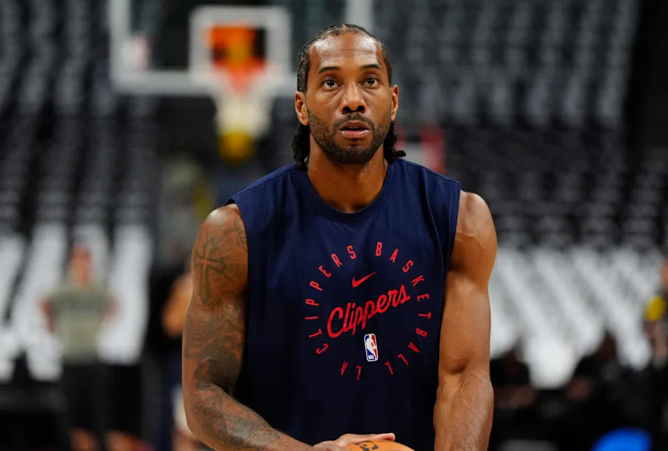 LA Clippers forward Kawhi Leonard (2) warms up before the game against the Denver Nuggets at Ball Arena. Ron Chenoy-Imagn Images