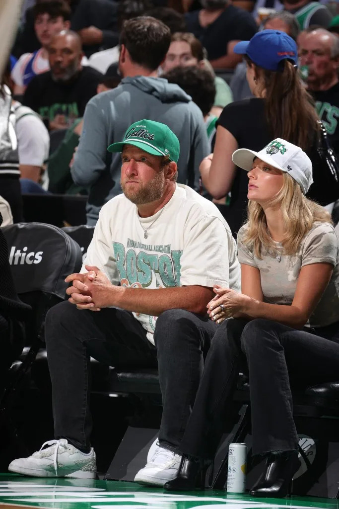 Dave Portnoy and Camryn D’Aloia sit courtside during Game 5. NBAE via Getty Images