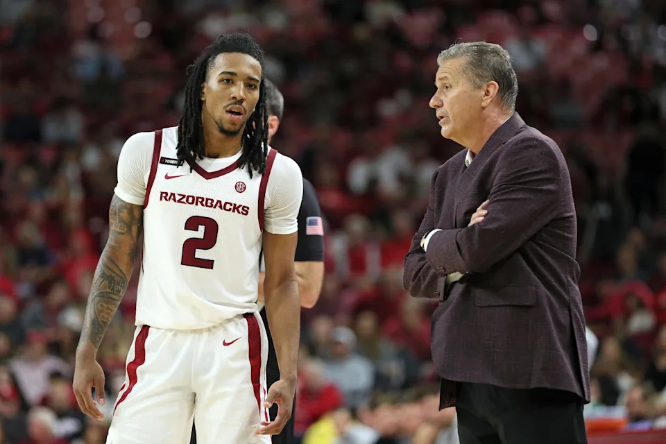 Nov 6, 2024; Fayetteville, Arkansas, USA; Arkansas Razorbacks head coach John Calipari talks to guard Boogie Fland (2) during the second half against the Lipscomb Bisons at Bud Walton Arena. Arkansas won 76-60. Mandatory Credit: Nelson Chenault-Imagn Images