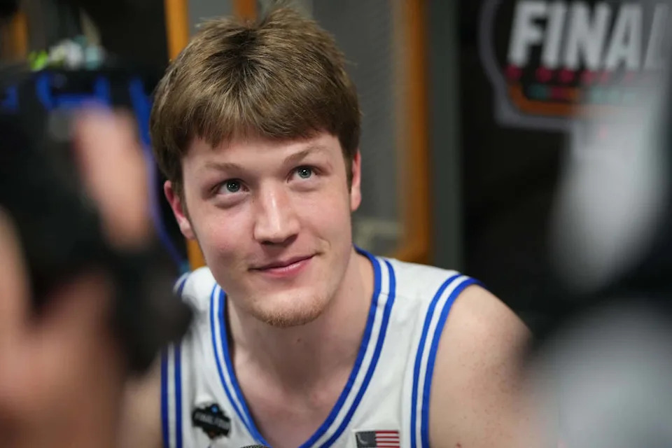 Duke Blue Devils guard Kon Knueppel (7) is interviewed during open locker room at Alamodome. Mandatory Credit: Bob Donnan-Imagn Images