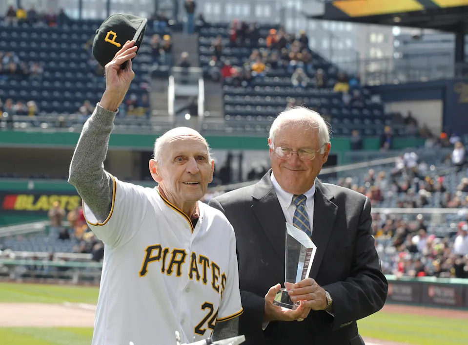 Former Pittsburgh Pirates former shortstop Dick Groat reacts as he is presented an award by former pitcher Steve Blass. Groat had a long baseball career but was also the third overall pick in the 1952 NBA draft.