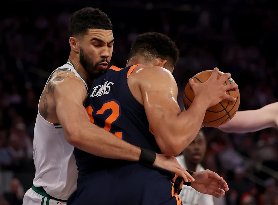 NEW YORK, NEW YORK - MAY 12: Karl-Anthony Towns #32 of the New York Knicks heads for the net as Jayson Tatum #0 of the Boston Celtics defends in the first half in Game Four of the Eastern Conference Second Round NBA Playoffs at Madison Square Garden on May 12, 2025 in New York City. NOTE TO USER: User expressly acknowledges and agrees that, by downloading and or using this photograph, User is consenting to the terms and conditions of the Getty Images License Agreement. (Photo by Elsa/Getty Images). (Photo by Elsa/Getty Images)