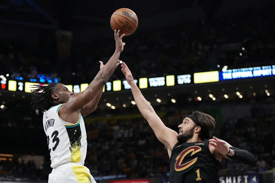 Indiana Pacers guard Aaron Nesmith (23) shoots over Cleveland Cavaliers forward Max Strus during Game 4 of an Eastern Conference semifinal May 11, 2025, in Indianapolis, Indiana.