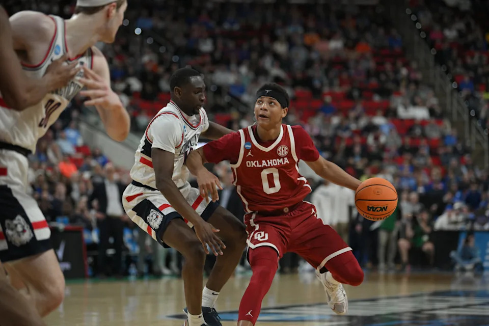 Mar 21, 2025; Raleigh, NC, USA; Oklahoma Sooners guard Jeremiah Fears (0) controls the ball against Connecticut Huskies during the second half at Lenovo Center. Mandatory Credit: Zachary Taft-Imagn Images