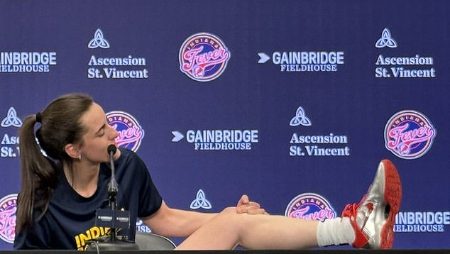 Clark showed off her Nike sneakers at a pregame press conference before Saturday's game