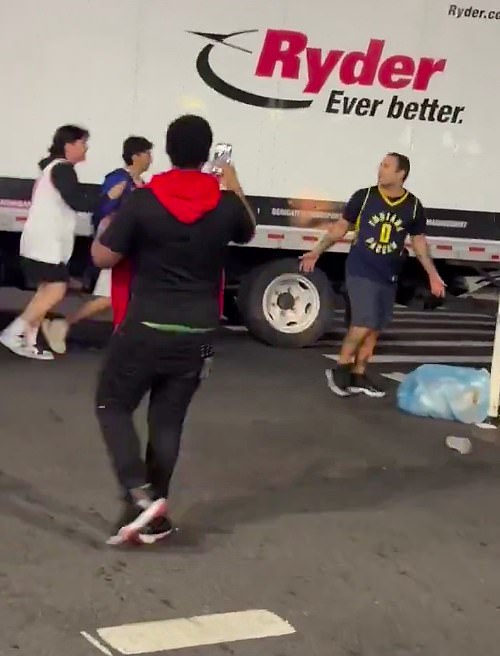 The Knicks faithful threw bags of trash at the Pacers fan before chasing him down the street