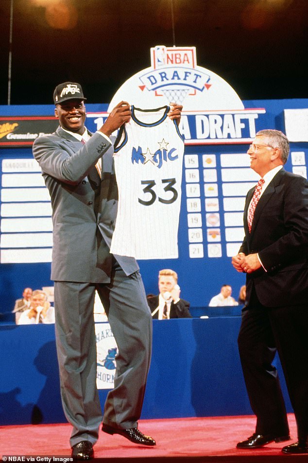 Commissioner David Stern and Orlando Magic first-round draft pick Shaquille O'Neal in 1992