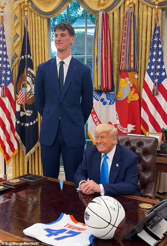 Olivier Rioux towered over President Donald Trump as they posed for a photo in the Oval Office