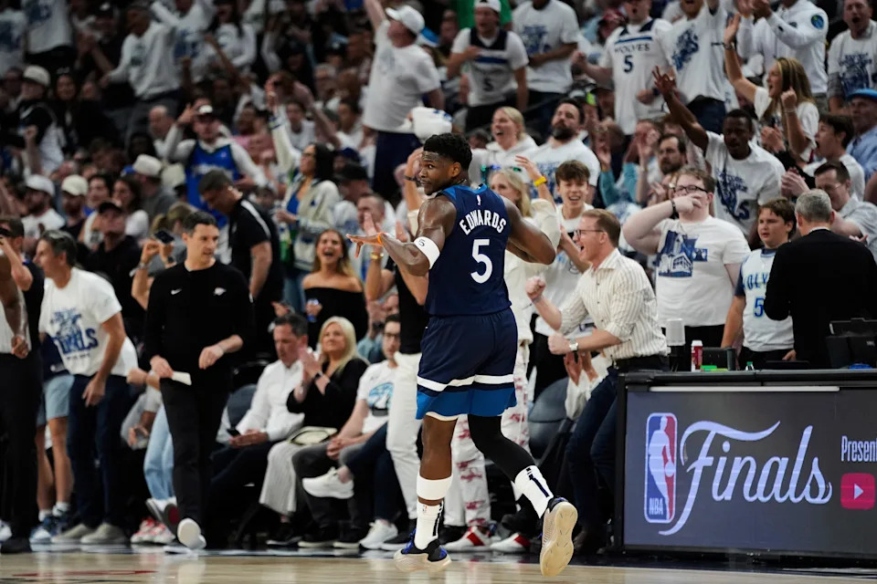 Minnesota Timberwolves guard Anthony Edwards (5) reacts after making a 3-pointer against the Oklahoma City Thunder during the first half of Game 3 of the Western Conference finals of the NBA basketball playoffs, Saturday, May 24, 2025, in Minneapolis. (AP Photo/Abbie Parr)