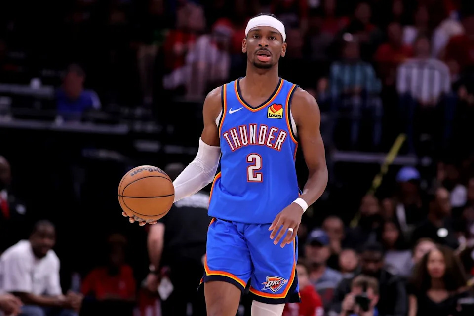 Oklahoma City Thunder guard Shai Gilgeous-Alexander handles the ball against the Houston Rockets.Erik Williams-Imagn Images