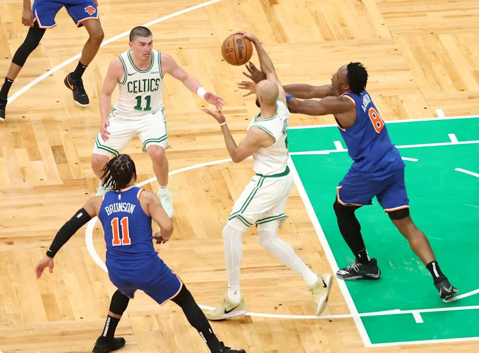 Derrick White and OG Anunoby rush for a rebound during the Knicks’ Game 1 OT win over the Celtics.<br> Charles Wenzelberg/New York Post