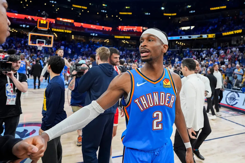 Thunder's Shai Gilgeous-Alexander (2) greets Grizzlies' Jaylen Wells (0) after the Thunder defeated the Grizzlies 117-115 in Game 4 to win the first-round NBA playoff series at FedExForum in Memphis, Tenn., on Saturday, April 26, 2025.
