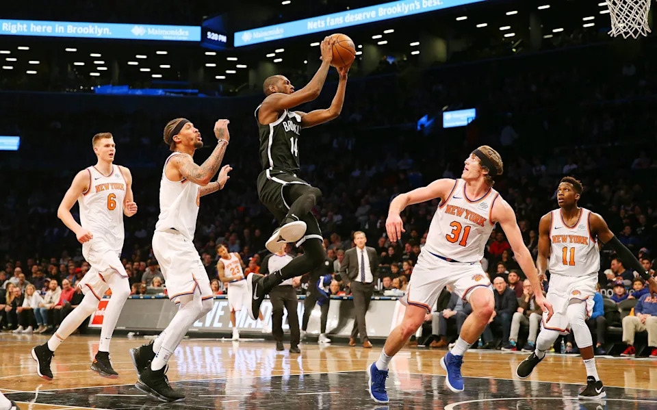 Jan 15, 2018; Brooklyn, NY, USA; Brooklyn Nets guard Milton Doyle (14) goes up for a shot against the New York Knicks during the second half at Barclays Center. Mandatory Credit: Andy Marlin-USA TODAY Sports