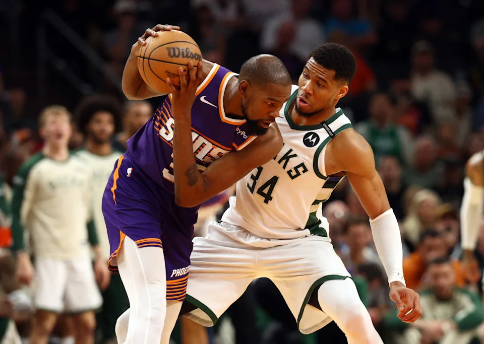Milwaukee Bucks forward Giannis Antetokounmpo (34) and Phoenix Suns forward Kevin Durant (35).© Mark J&period; Rebilas-Imagn Images