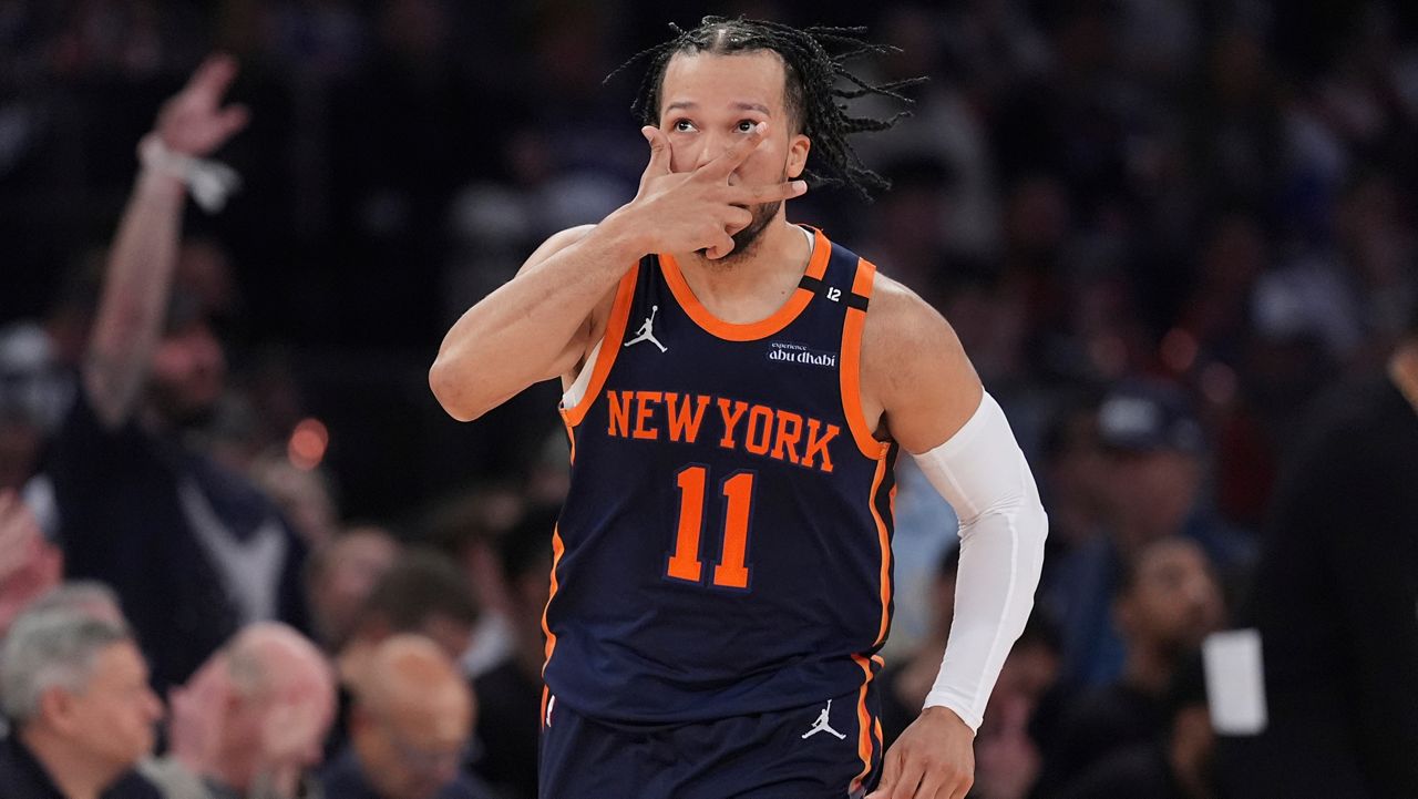 New York Knicks' Jalen Brunson (11) gestures after making a three-point shot during the second half of Game 4 in the Eastern Conference semifinals of the NBA basketball playoffs against the Boston Celtics Monday, May 12, 2025, in New York. (AP Photo/Frank Franklin II)