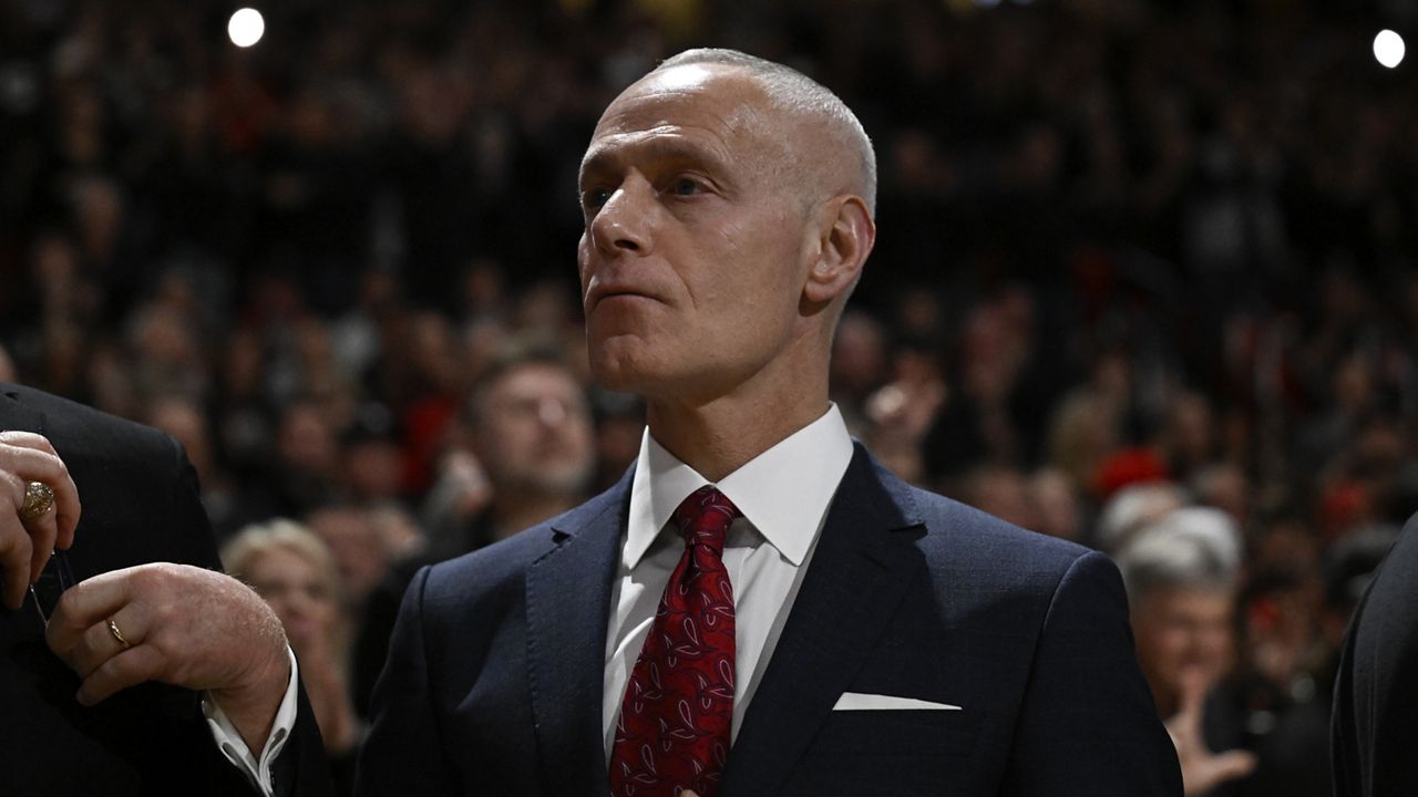 Big 12 Commissioner Brett Yormark stands on the sideline before an NCAA college basketball game between Texas Tech and Houston Monday, Feb. 24, 2025, in Lubbock, Texas. (AP Photo/Justin Rex)