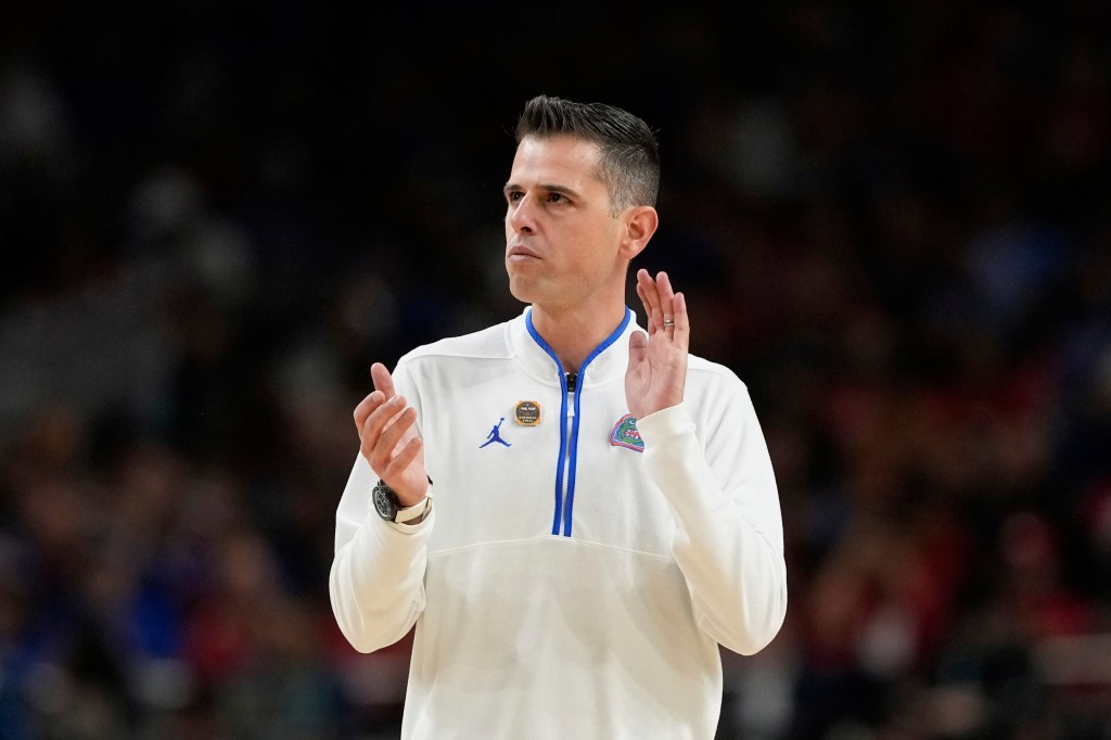 Florida head coach Todd Golden encourages his players during the first half in the national championship game against Houston at the Final Four of the NCAA college basketball tournament, Monday, April 7, 2025, in San Antonio.