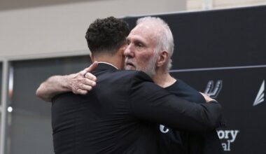 Former San Antonio Spurs head coach Gregg Popovich, right, hugs Mitch Johnson, left, the new head coach of the San Antonio Spurs NBA basketball team, in San Antonio, Monday, May 5, 2025. (AP Photo/Eric Gay)