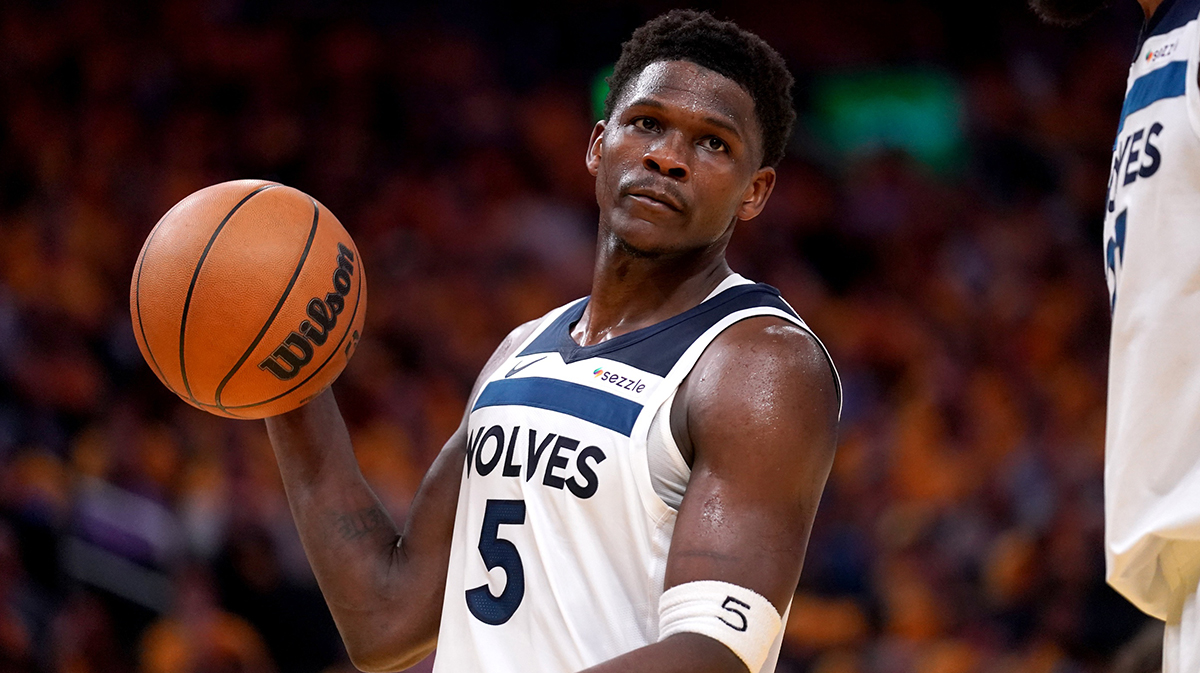 Minnesota Timberwolves guard Anthony Edwards (5) holds onto the ball after being called for a foul against the Golden State Warriors in the third quarter during game four of the second round for the 2025 NBA Playoffs at Chase Center. 