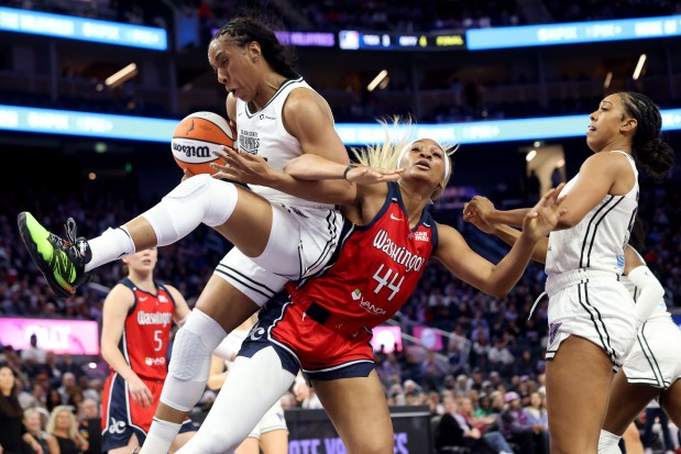 Golden State Valkyries' Kayla Thornton (5) is fouled by Washington Mystics' Kiki Iriafen (44) on a rebound in the third quarter of a WNBA game at Chase Center in San Francisco, Calif., on Wednesday, May 21, 2025. (Ray Chavez/Bay Area News Group)