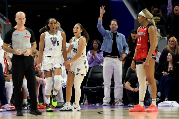 Golden State Valkyries' Kayla Thornton (5) and Golden State Valkyries' Veronica Burton (22) celebrate after Thornton scored a three point basket as Washington Mystics' Kiki Iriafen (44) looks on in the fourth quarter of a WNBA game at Chase Center in San Francisco, Calif., on Wednesday, May 21, 2025. (Ray Chavez/Bay Area News Group)