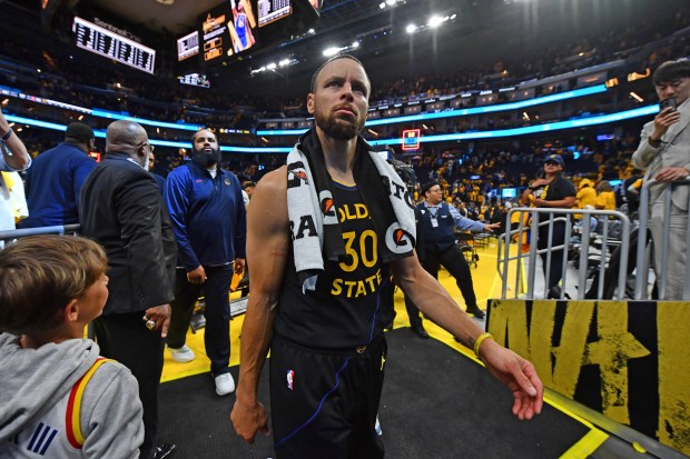Golden State Warriors' Stephen Curry (30) walks off the court after Game 6 of the Western Conference First Round NBA Playoffs game at Chase Center in San Francisco, Calif., on Friday, May 2, 2025. The Houston Rockets defeated the Golden State Warriors 115-107. (Jose Carlos Fajardo/Bay Area News Group)