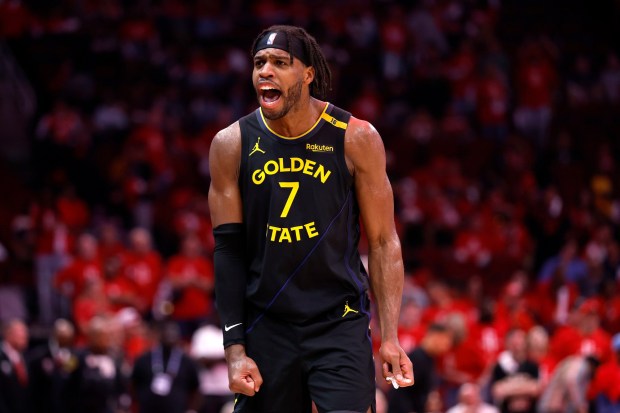 Buddy Hield #7 of the Golden State Warriors reacts against the Houston Rockets after making a three-point basket during the fourth quarter in Game Seven of the Western Conference First Round NBA Playoffs at Toyota Center on May 04, 2025 in Houston, Texas. (Photo by Tim Warner/Getty Images)