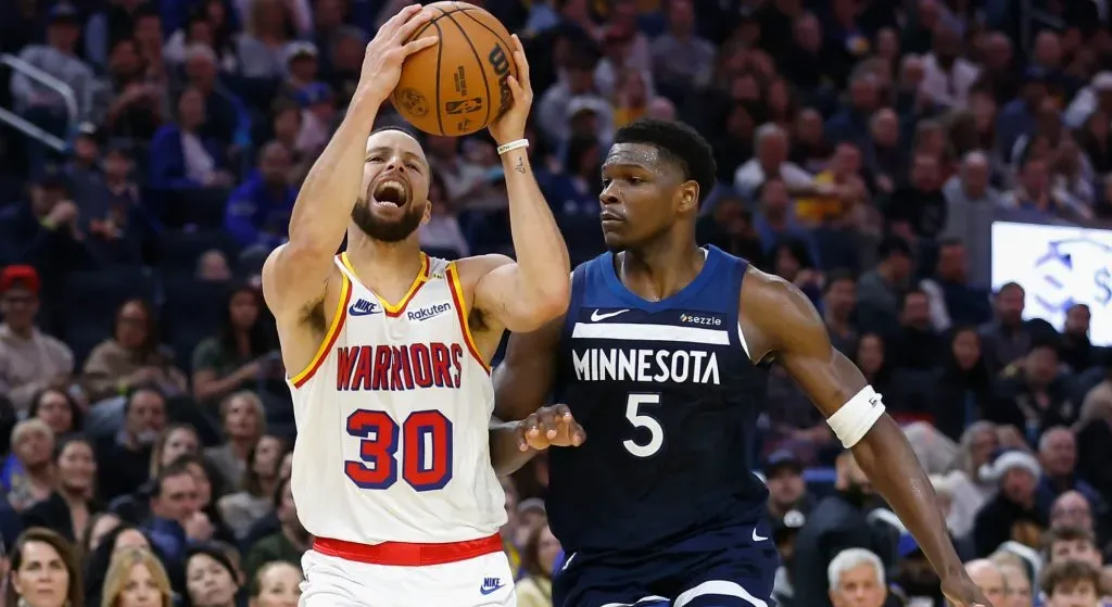 Stephen Curry and Anthone Edwards palying against each other