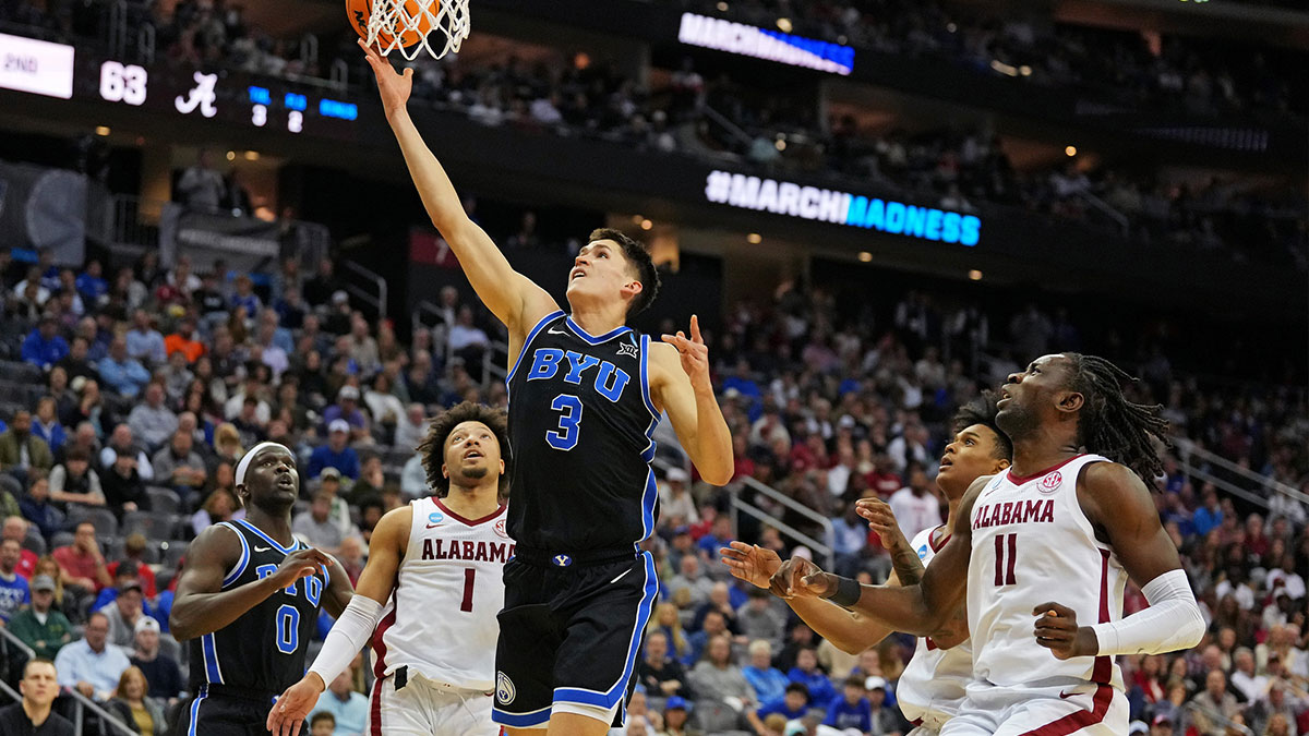 Brigham Young Cougars guard Egor Demin (3) drives to the basket against Alabama Crimson Tide guard Mark Sears (1) during the second half during an East Regional semifinal of the 2025 NCAA tournament at Prudential Center.
