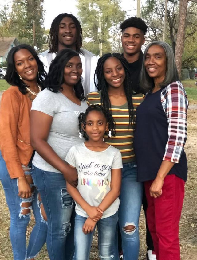 Family portrait of seven people.