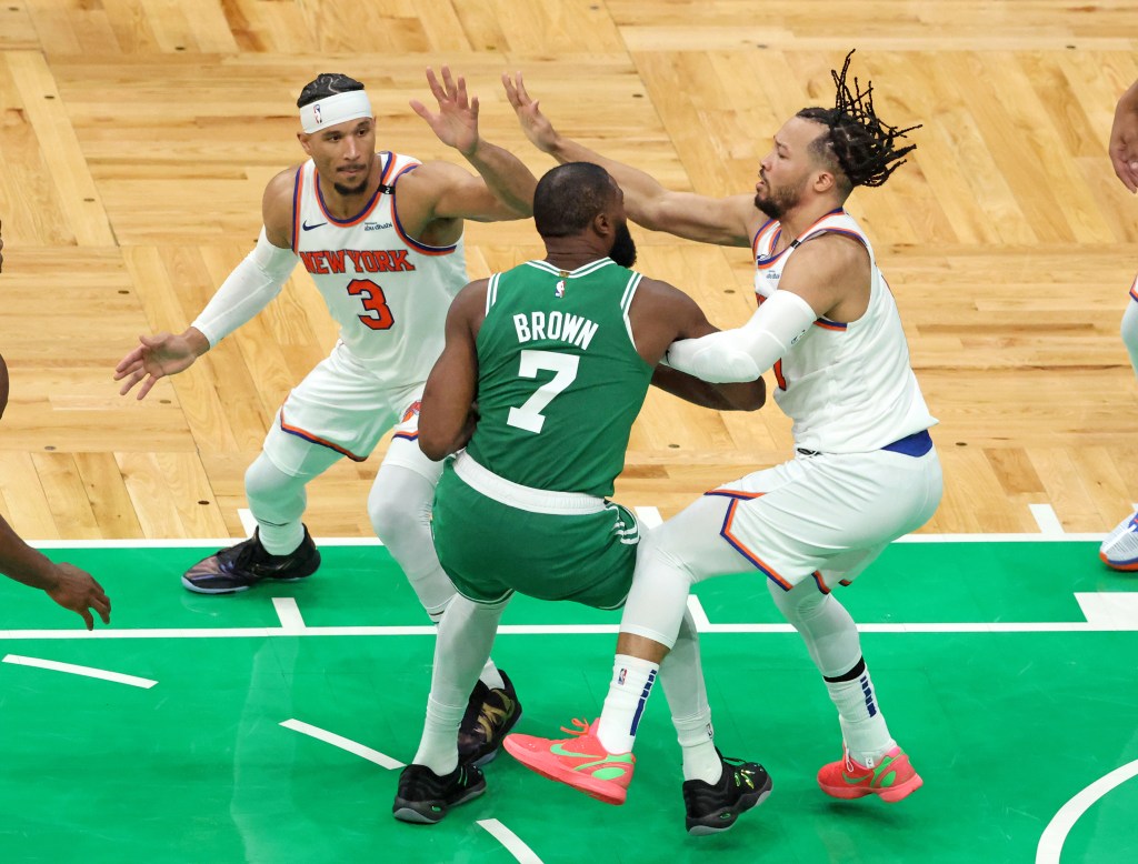 Jalen Brunson (right) and Josh Hart double team Jaylen Brown during the Knicks' Game 2 comeback win over the Celtics.
