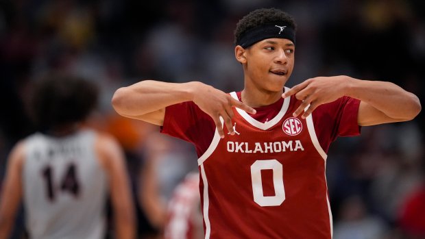 Oklahoma guard Jeremiah Fears celebrates a 3-pointer against Georgia during the SEC Tournament on March 12, 2025, in Nashville, Tenn. (AP Photo/George Walker IV)