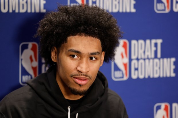 Dylan Harper answers questions from reporters during media availability at the NBA draft combine on May 14, 2025, at Wintrust Arena. (Michael Reaves/Getty Images)
