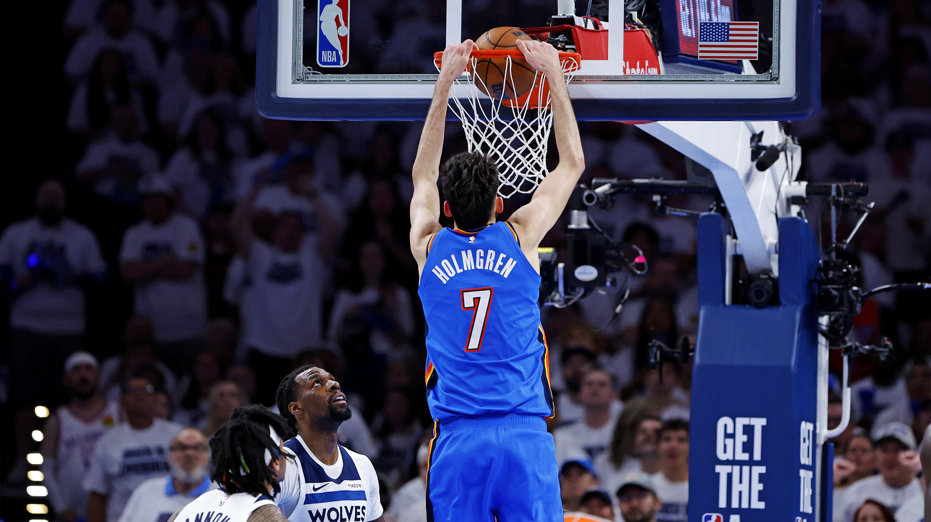 Oklahoma City Thunder forward Chet Holmgren (7) dunks the ball against Minnesota Timberwolves center Naz Reid (11) during the second quarter in game five of the western conference finals for the 2025 NBA Playoffs at Paycom Center.