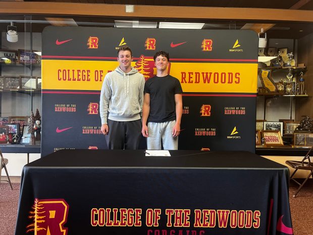 CR commit Dawson Vallerga (right) stands next to Montana basketball commit Luke Moxon (left) at Vallerga's signing on Friday. (Dylan McNeill/Times-Standard)