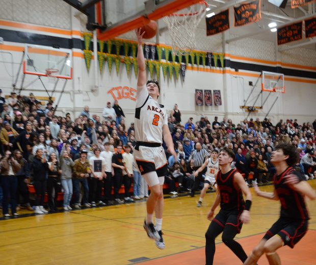 Arcata High senior Dawson Vallerga rises for a layup against McKinleyville this past season. Vallerga becomes the latest Tigers' basketball player to play at CR. (Dylan McNeill/Times-Standard)